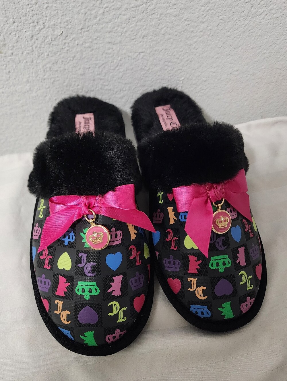 Juicy Couture Black Slides with Hot Pink Bows and Multicolor Logo Print
